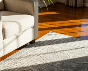 Clean upholstered armchair beside a freshly cleaned area rug